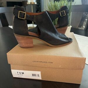 Black suede Lucky Brand booties.